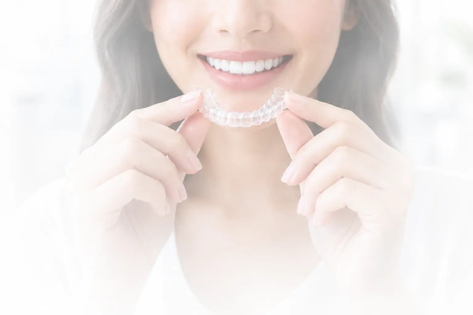 invisalign-clear-aligners-treatment-smiling-patient